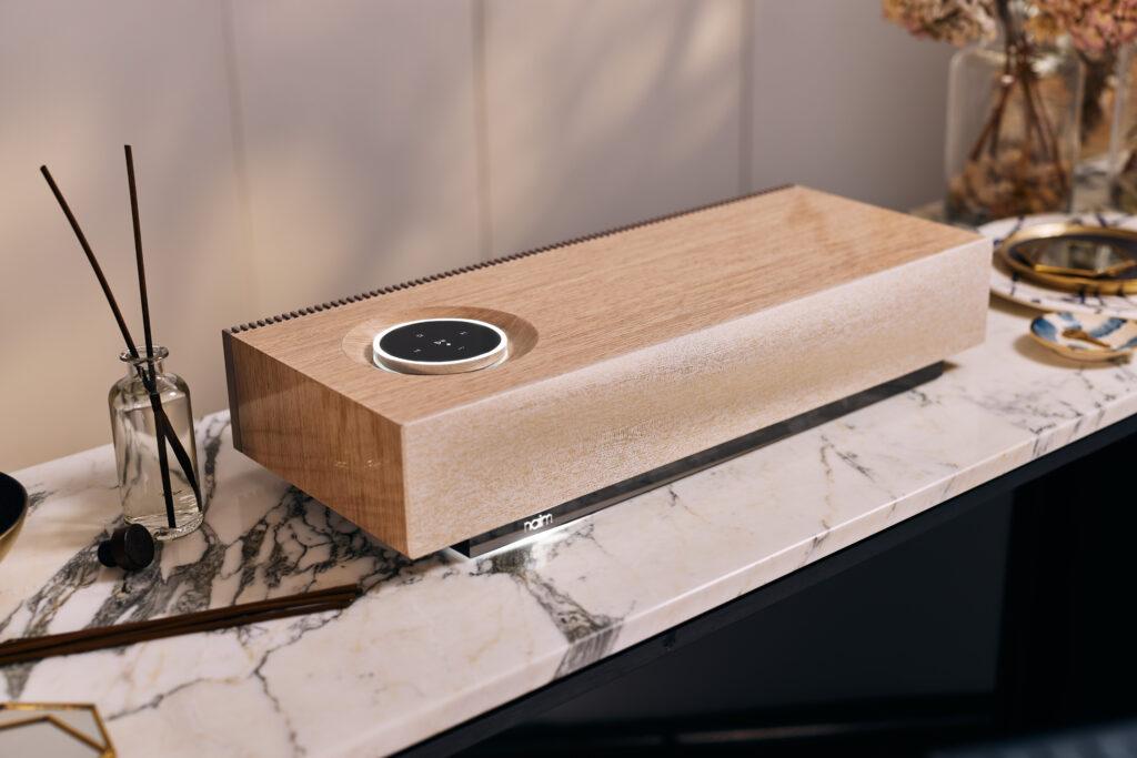 Naim Audio has announced a new premium Wood Edition of its Mu-so 2nd Generation - a wireless system that is flexible enough for both music and TV sound. 0a0357f9 naim audio lifestyle03620