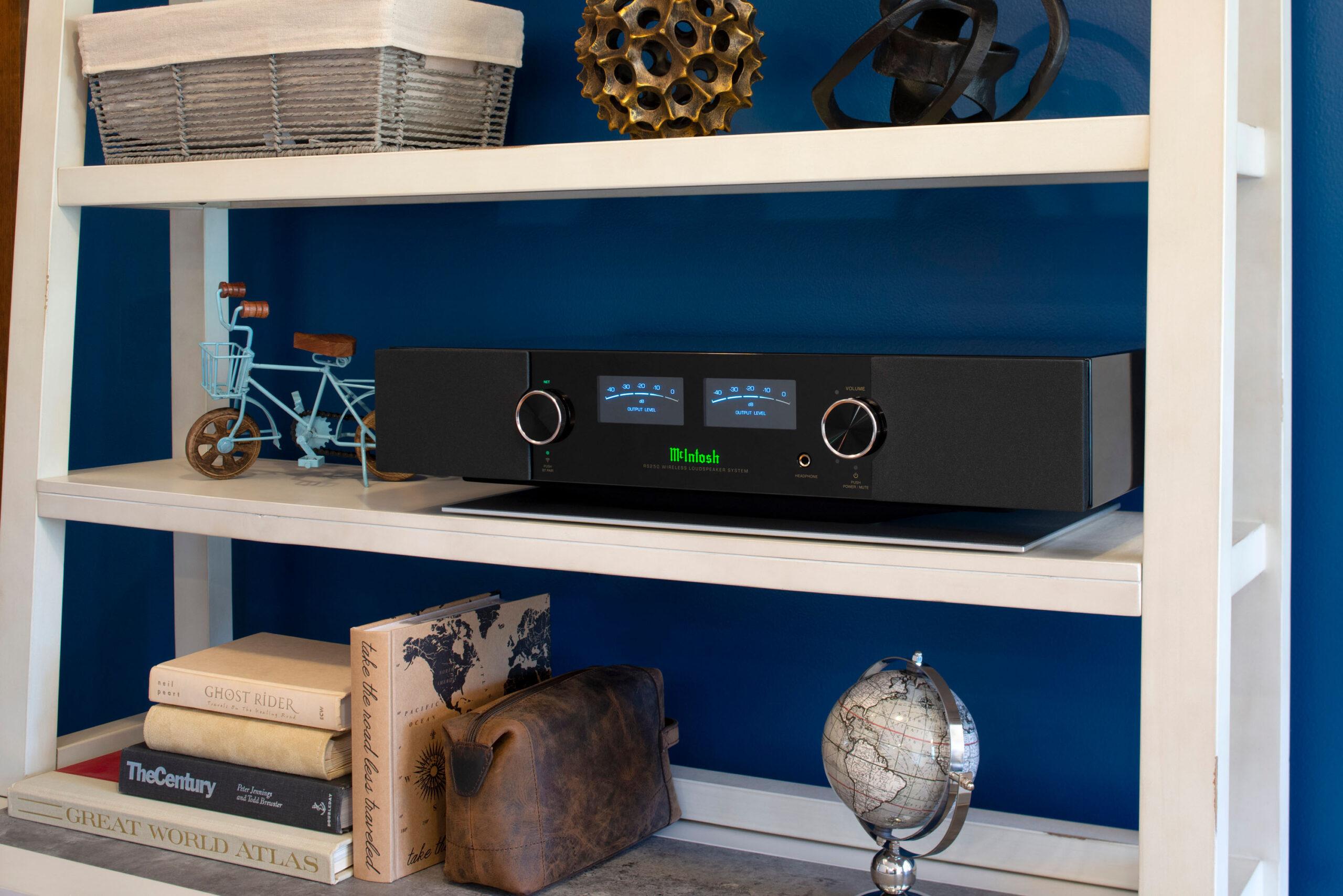 Two wireless speakers, the RS150 and RS250, offer streaming convenience with unmistakable McIntosh style, quality & performance. McIntosh 25e62858 rs250 lifestyle shelf hi res scaled