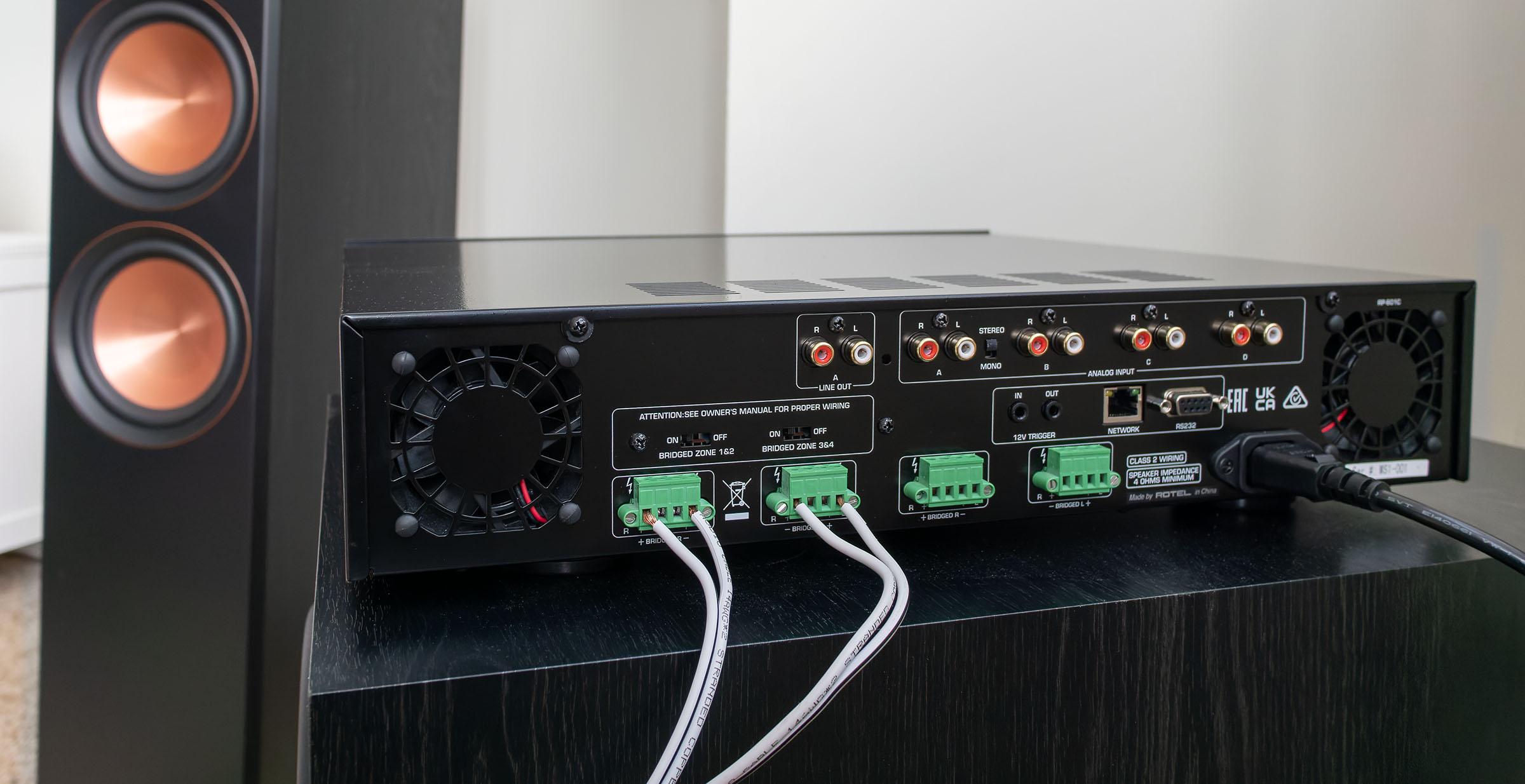 An 8-channel bridgeable class A/B amp that is both custom install-friendly and audiophile quality. f511b42f rotel c8 distribution amp rear