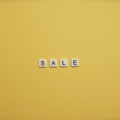 Sale text on yellow background