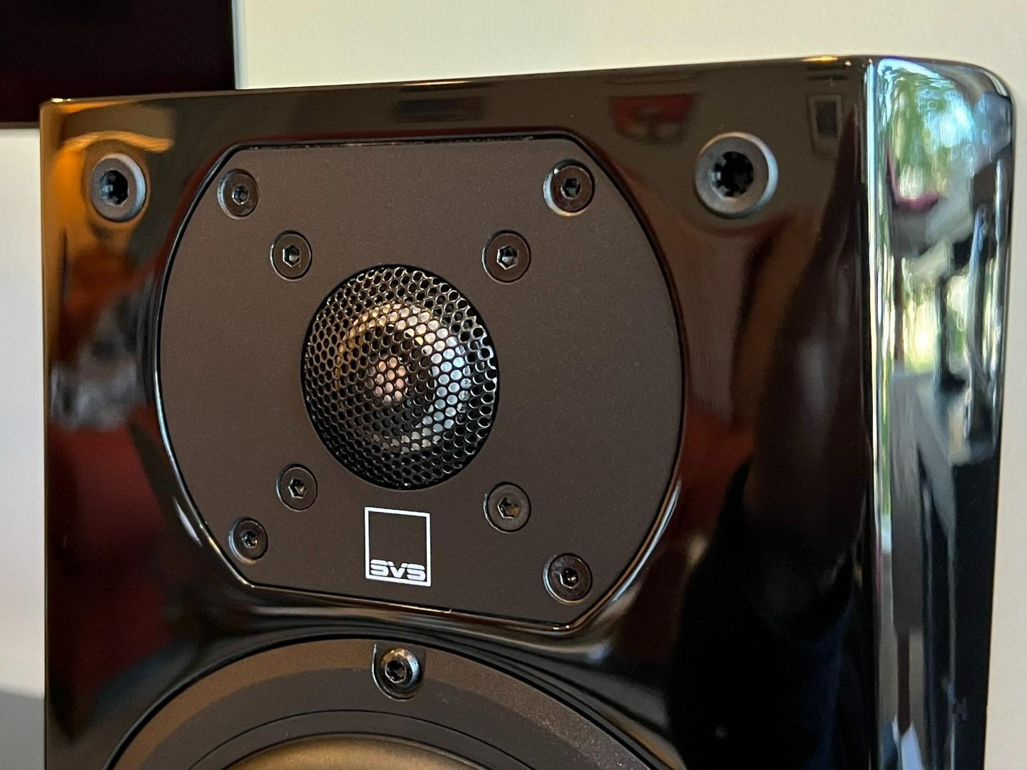The tweeter of the glossy black Prime Wireless Pro speaker is shown with acoustic grille removed.