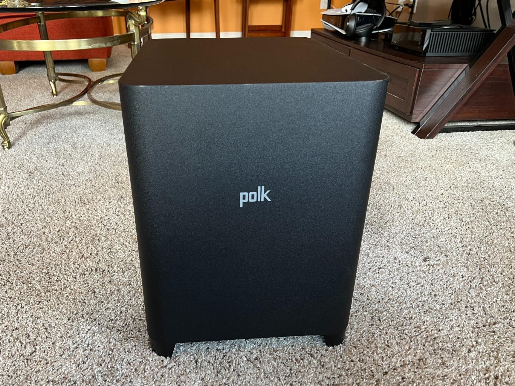 The Polk Magnifi Max AX soundbar's subwoofer is shown from the front side.