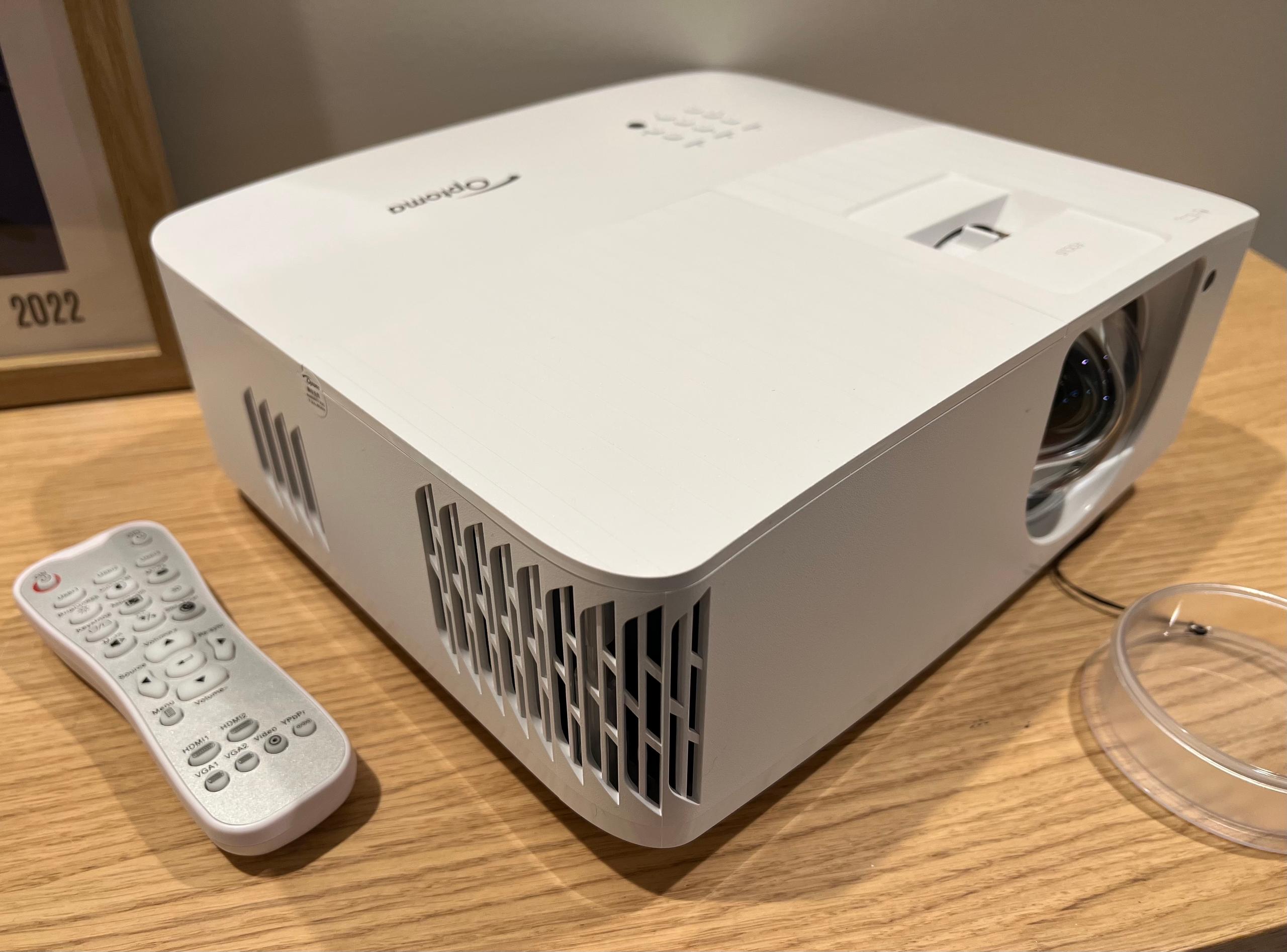 Optoma's UHD35STx short-throw 4K projector is affordable, but performance is lacking. e7c25b24 optoma uhd35stx left vent and remote