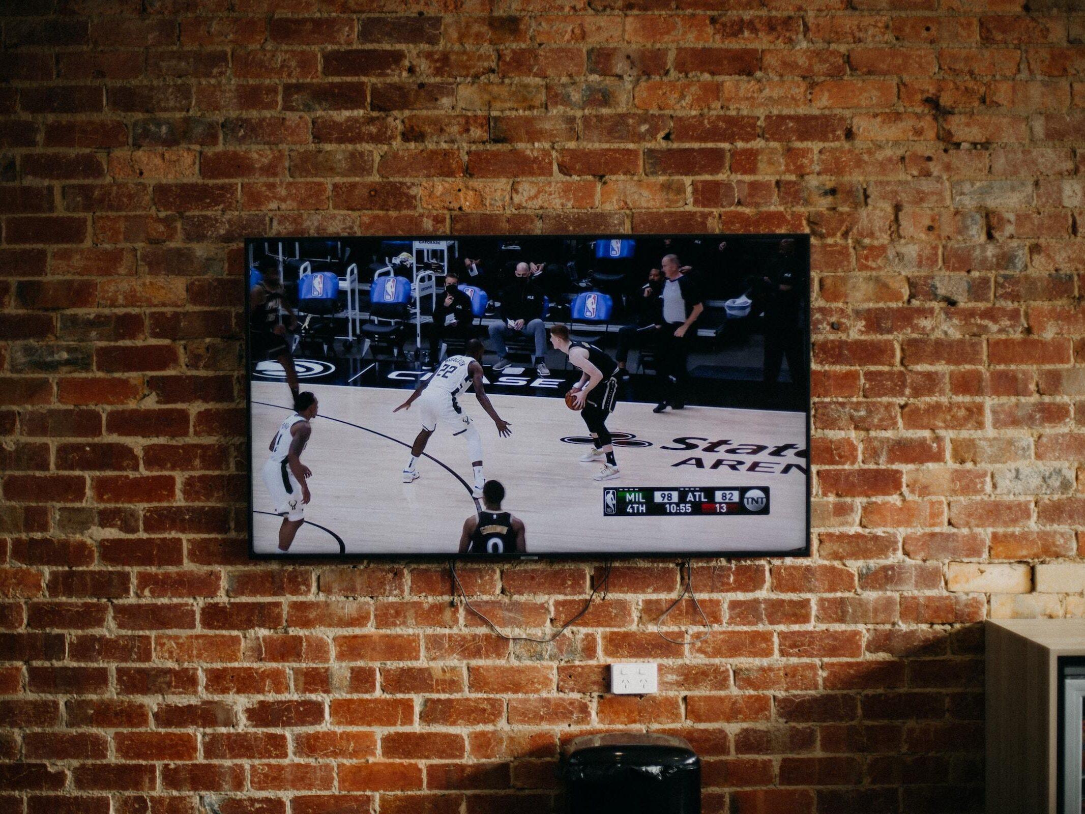 A flat screen TV mounted on a wall