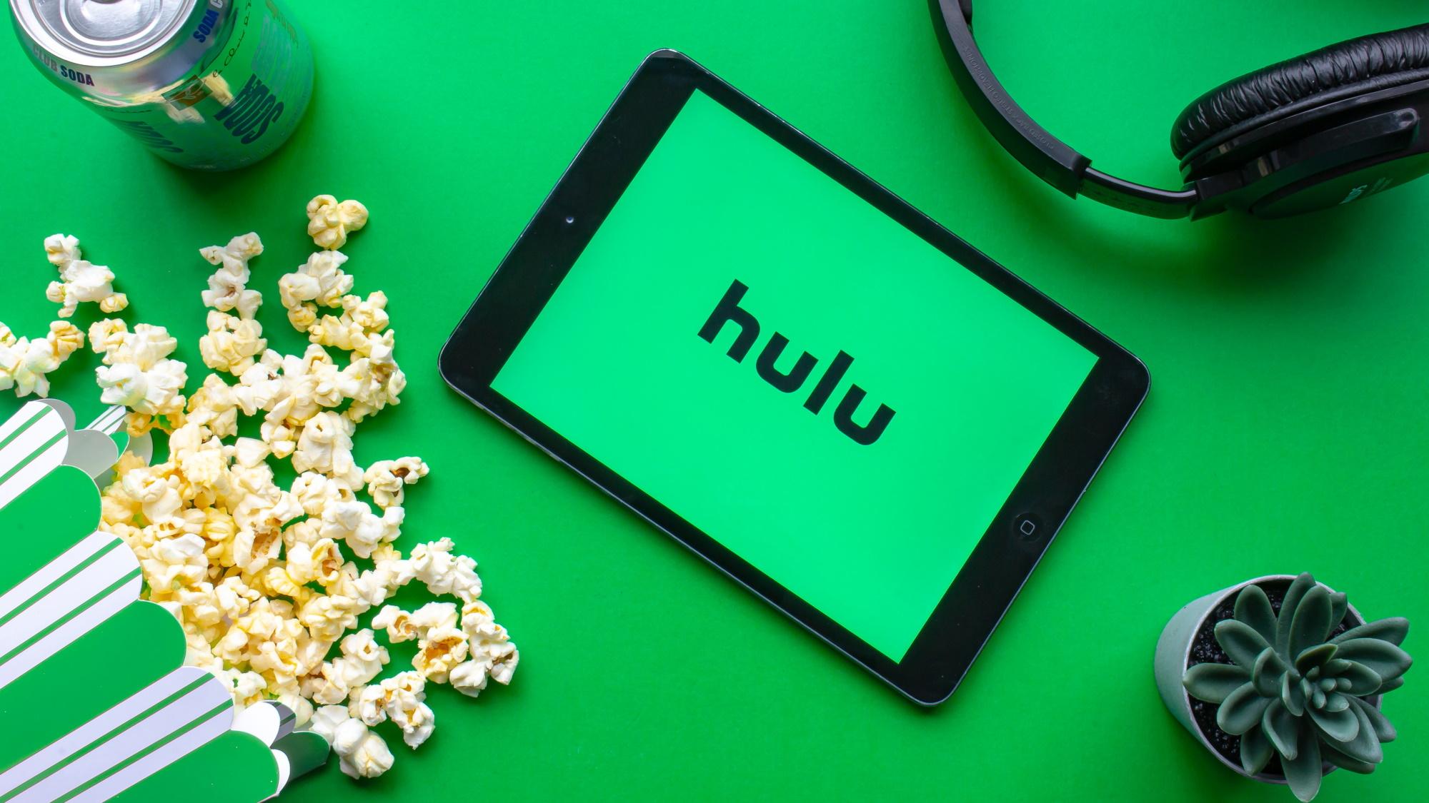 Hulu on an tablet, green background
