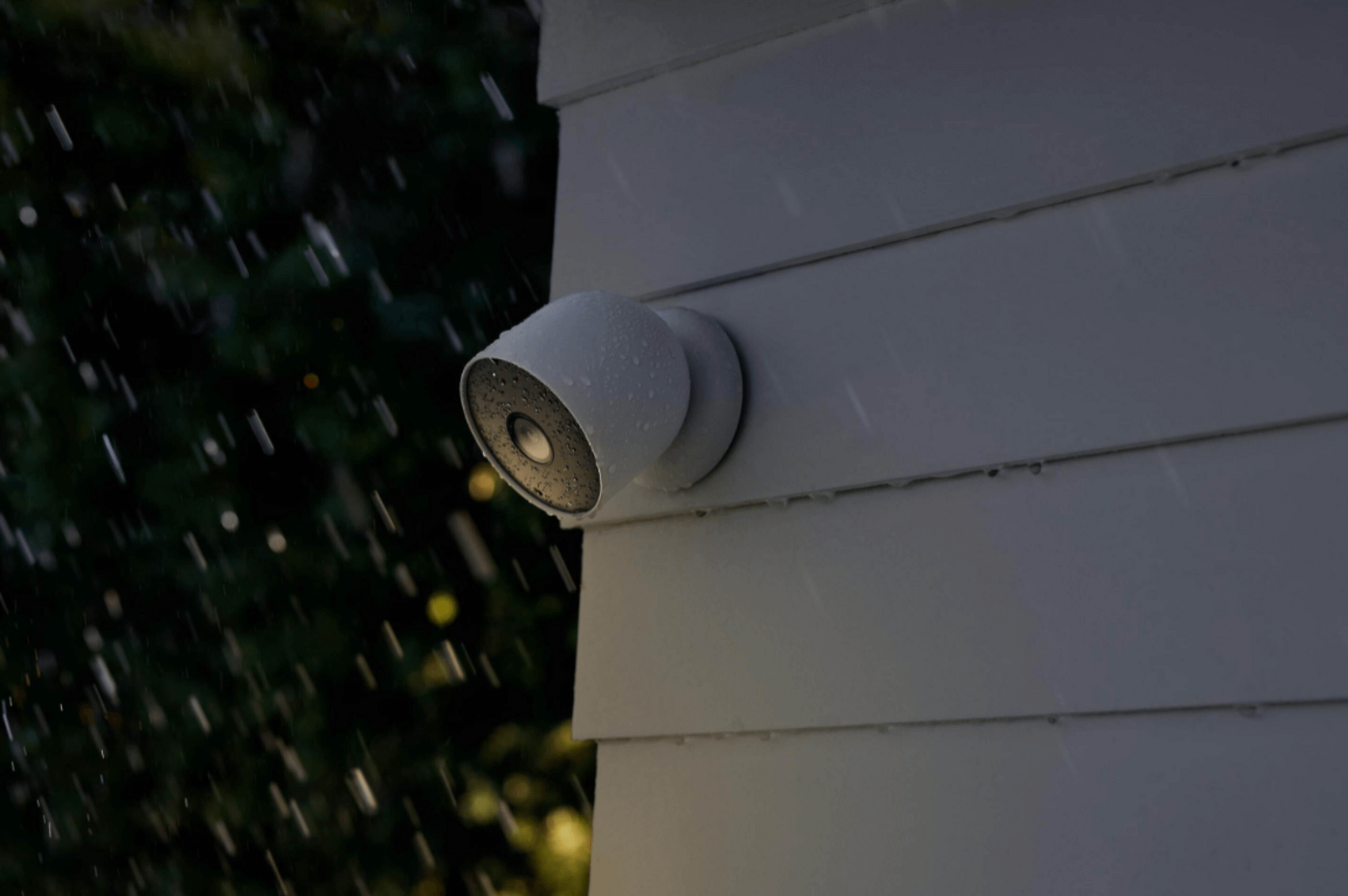 Ring security camera on the wall in a rainy day