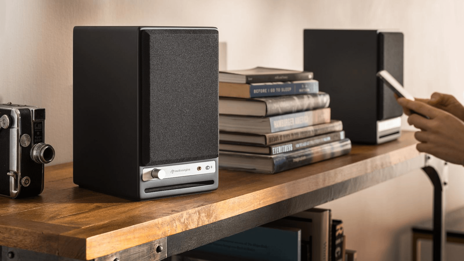 I Found the Perfect Desktop Speakers—And They’re $100 Off Ahead of Black Friday 3 Audioengine HD4 speakers in black color on shelf.